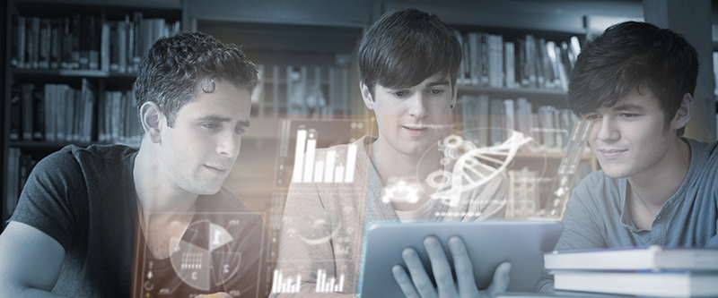 Men sitting at the library while looking at the tablet PC
