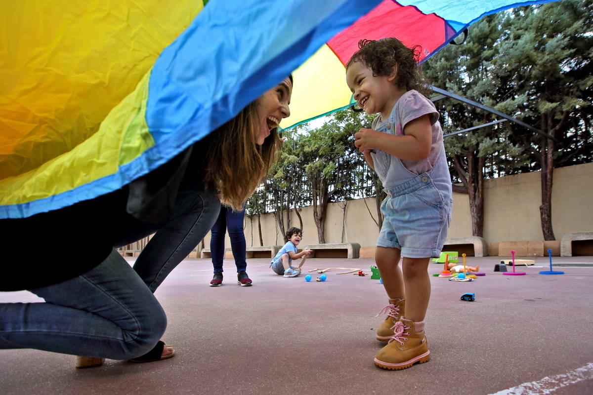 Families_playing with smiles 1 (Spain)_PH CREDIT Bruno Zanzottera Parallelozero